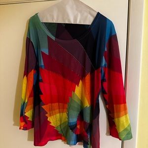 Compliments multi color top with fun rhinestones size L